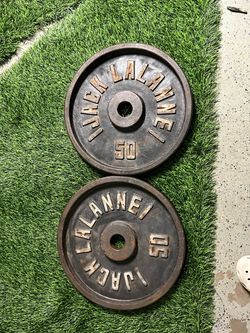 Pair of Jack LaLanne 50 lb Cast Iron Olympic Weight Plates