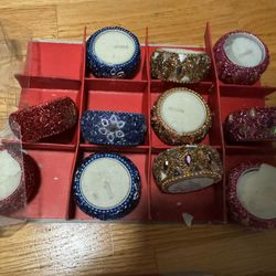 2 sets of candles, $10 each set of candles