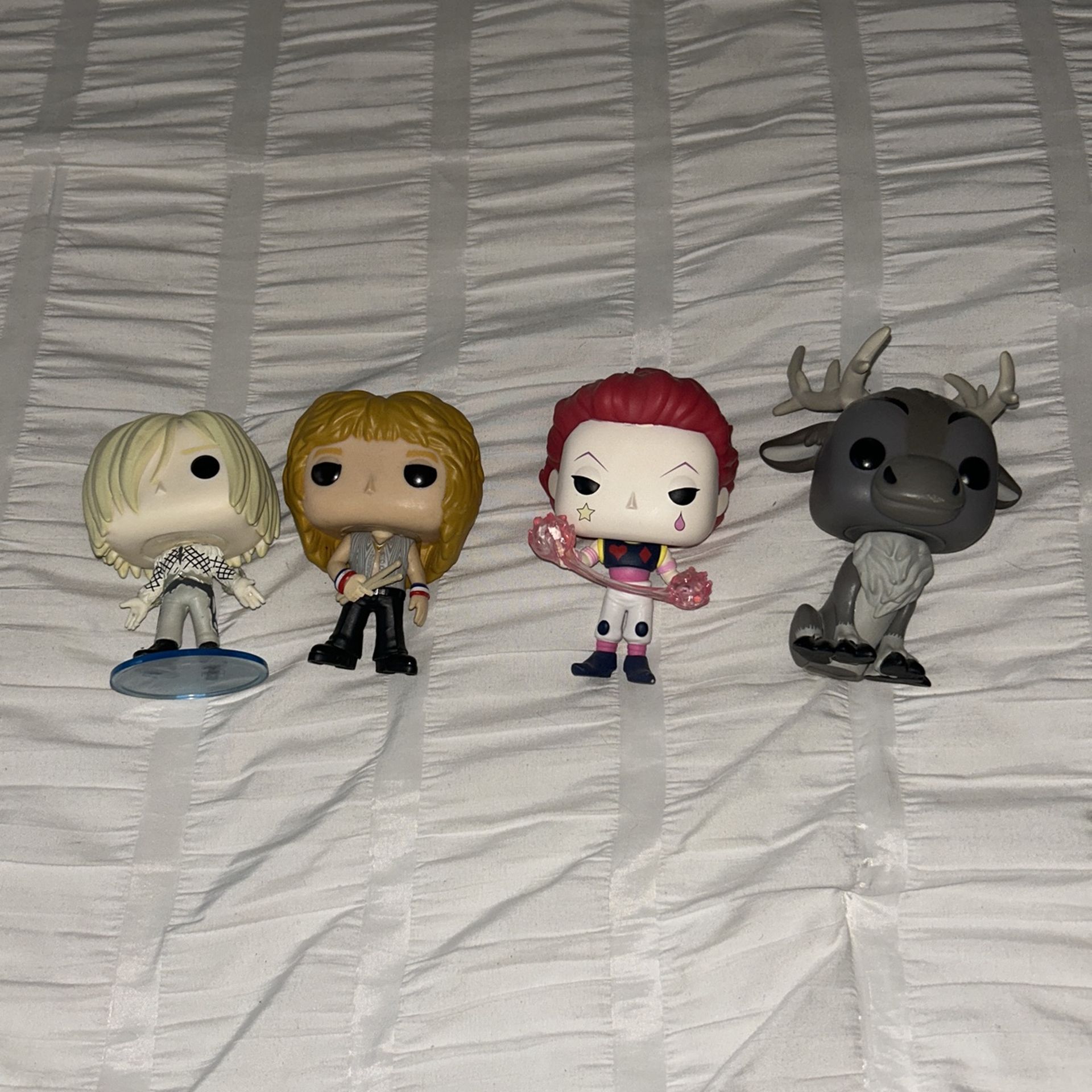 Funko Pops - Hisoka, Sven, Yuri, and Roger Taylor