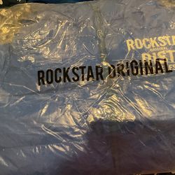 A coat and Nike boots