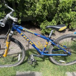 Trek Mountain Bike In Good Condition Tires Flat.