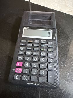 Casio HR-10RC 12-digit printing calculator.