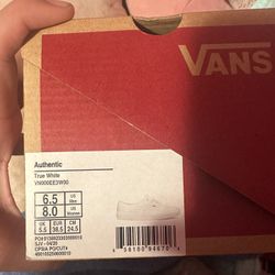 white Vans.