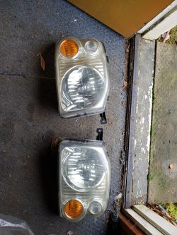 2004 frontier headlights oem