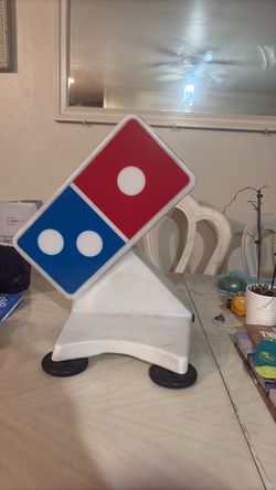 Dominos sign