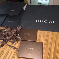 Empty Gucci Bags And Ribbon