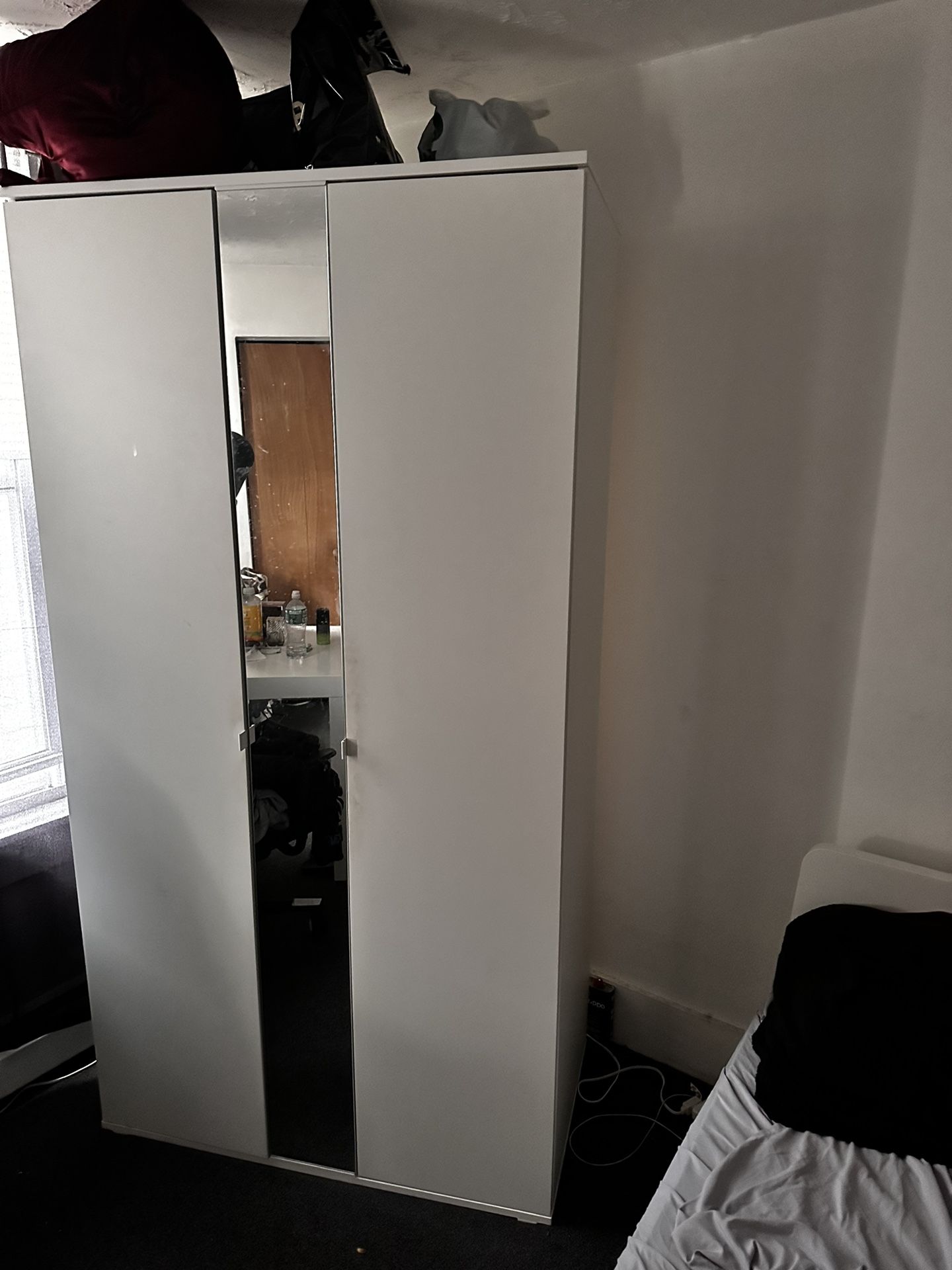 Bed, Tv Table, And Wardrobe