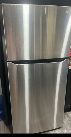 LG Stainless Steel Top-Freezer Refrigerator and LG stainless steel stove