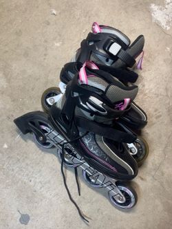 Size 8 roller blades almost new