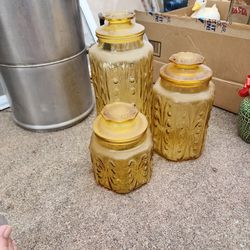 Set of Yellow Glass Containers