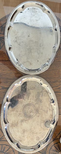 2 metal oval serving platters, 13”X18”, both for $7.00.