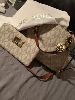 Bran new Michael Kors purse and wallet