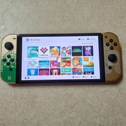 NINTENDO SWITCH OLED with 120 SWITCH GAMES
