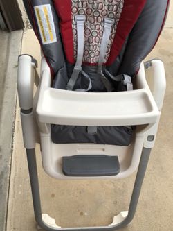 Graco slightly used high chair with three trays