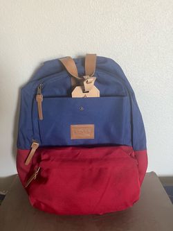 Levi's Heritage stylish Blue and Red backpack with a distinctive leather brand patch