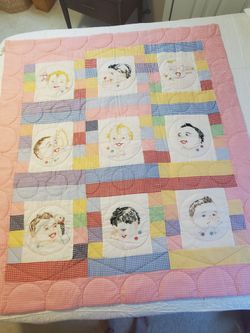 Vintage hand quilted, and embroidered baby quilt, never used