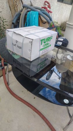 Turf nails and weed barrier