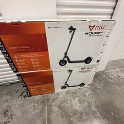 2 Openned  Box Brand new Scooters 