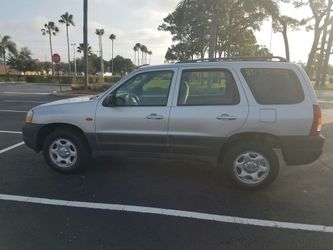 2400 cash for 2001 mazda tribute titulo limpio