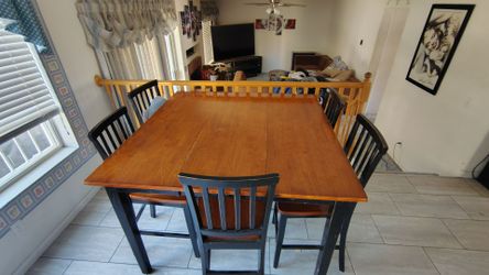 Dining room table with 5 chairs.