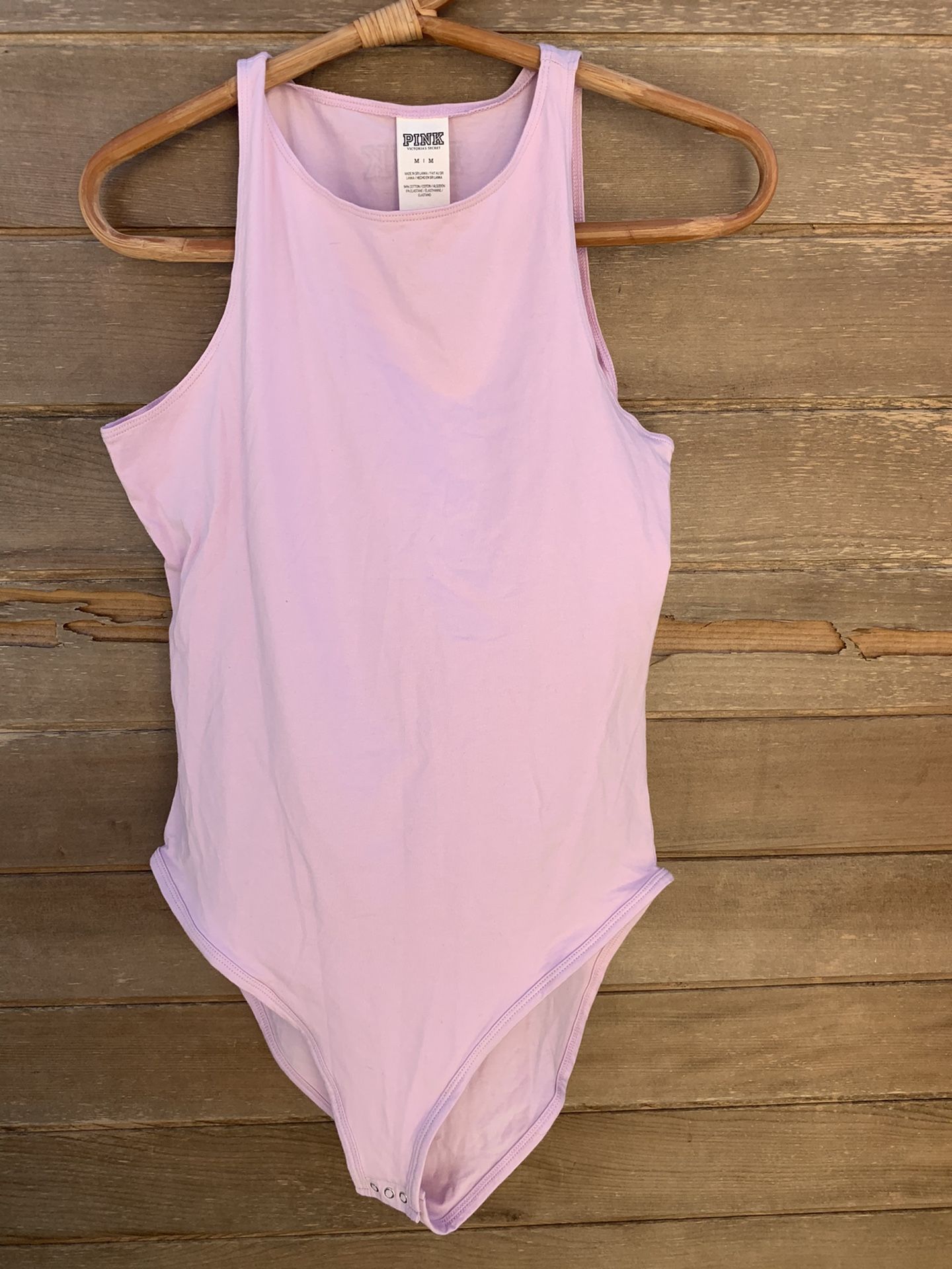 Pink NWT Bodysuit. A