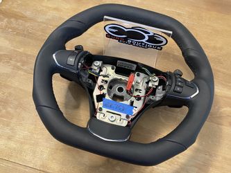 Custom CF steering wheels for many exotics and sports cars!