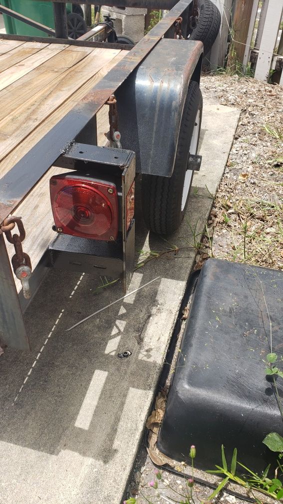 4X6 cargo utility trailer, wood deck, buddy bearing, new lights and 1 7/8 receiver. Have title. $500.00