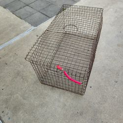 31 x 18 x 14" tall, mobile animal cage