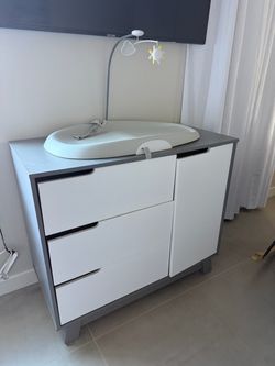 Baby dresser and changing pad bundle