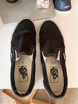Black slip on Vans