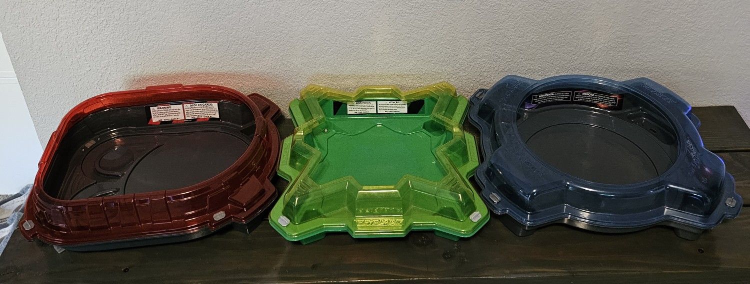 Beyblades And Stadiums