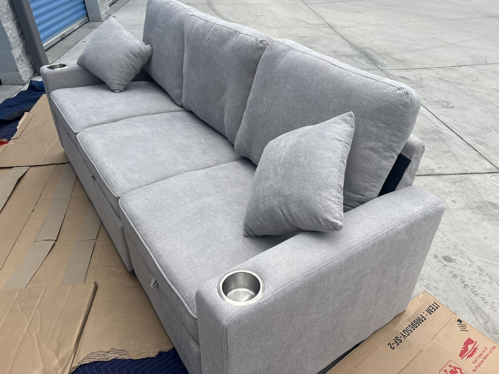 New Grey Couch W Pullout Bed. Free Delivery!