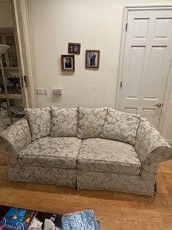 Floral Upholstered Sofa Bed inside with Throw Pillows