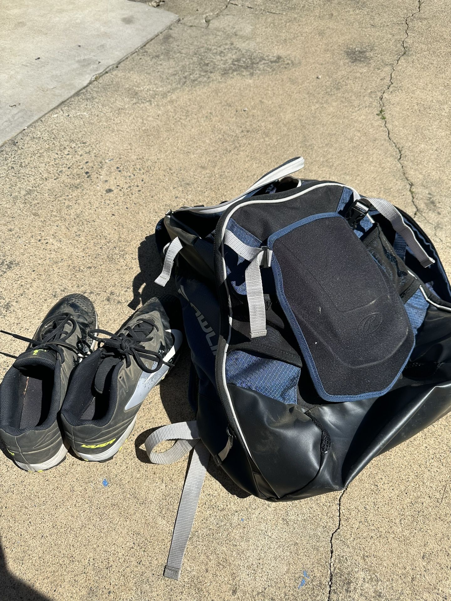 Baseball Cleats And Backpack