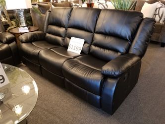 Brand new black reclining sofa