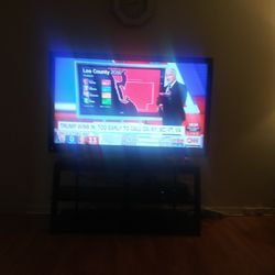 55 inch Sharp TV with TV stand