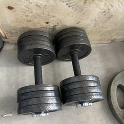 pair of 45lb adjustable dumbbells with plates. 90lb in total  $90