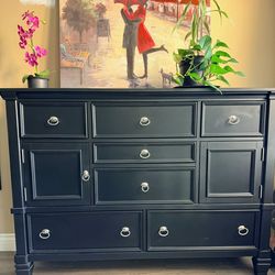 Tall black dresser