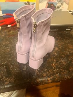 Purple boot and tennis shoes