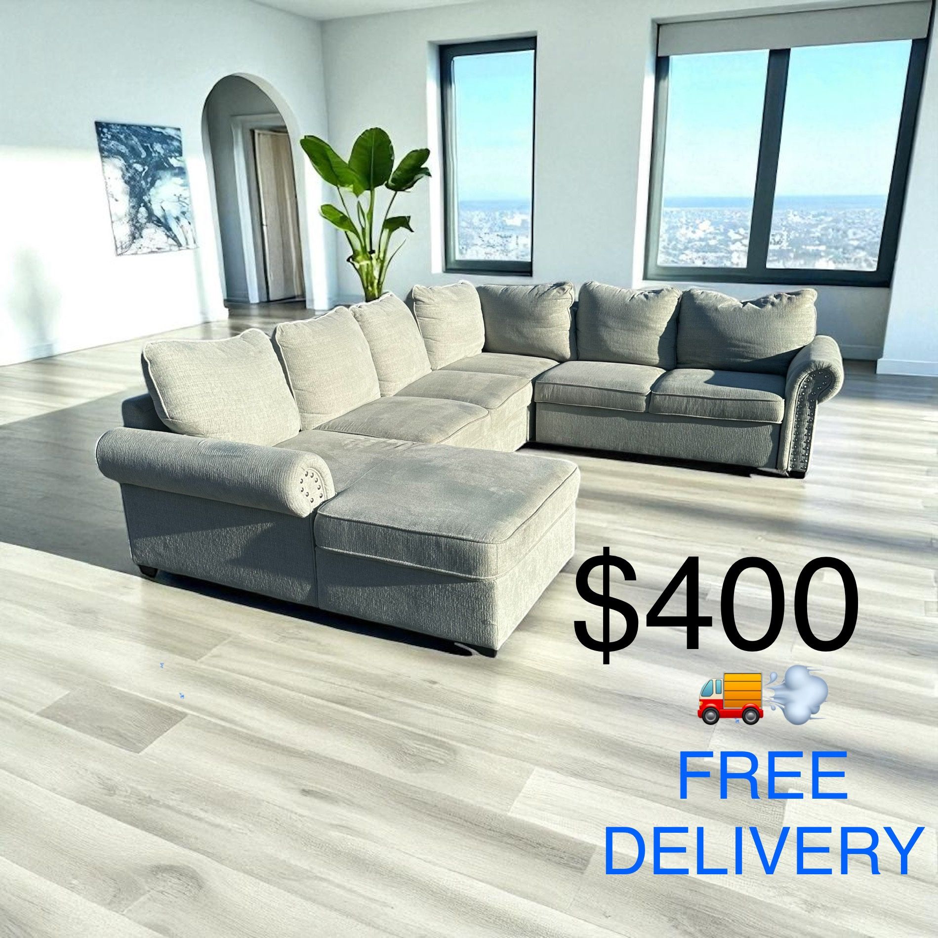 BOB'S DISCOUNT FURNITURE 4- PIECE SECTIONAL w/ PULLOUT BED(FREE DELIVERY)(CLIFTON HEIGHTS PA 19018)