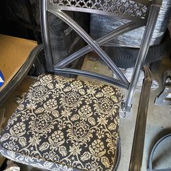 Iron patio Rocking Chairs With Navy and White Outdoor Cushion Included. 