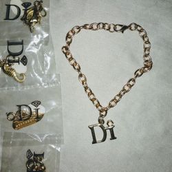 Diamonds International Charms Bracelet with 4 Charms. 7.5"