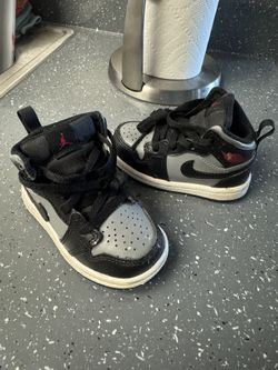 Baby Black And Gray Jordan’s Nikes 5c