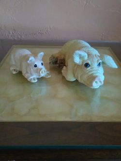 Two pig figures