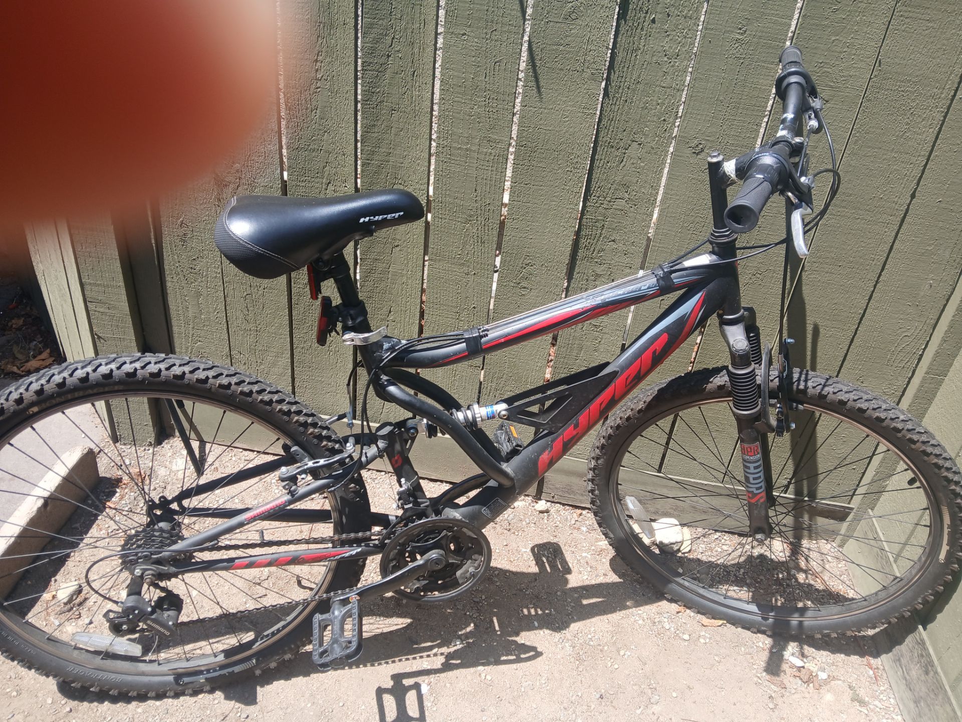 Hyper Mountain bike, black and red