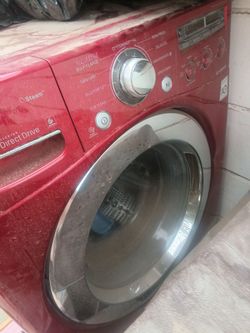 red LG front-load washer and  dryer