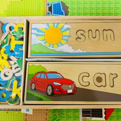 Melissa & Doug See & Spell Wooden Educational Toy with 8 Double-Sided Spelling Boards and 64 Letters Preschool Learning Activities, See & Spell Learni
