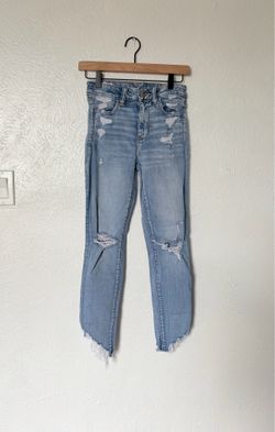 American Eagle Outfitters Next Level Stretch light blue distressed jeans size 4