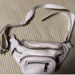 Versatile white belt bag, reminiscent of styles found at Urban Outfitters
