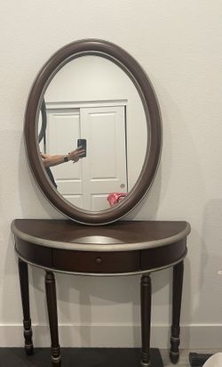 Used Mirror And Decorated Table